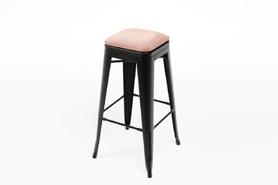 Die pinke Samtsitzauflage macht den schwarzen Bronx Barhocker besonders