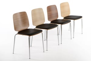 Unser Holzschalenstuhl Monaco SP hat ein Kunstledersitzpolster
