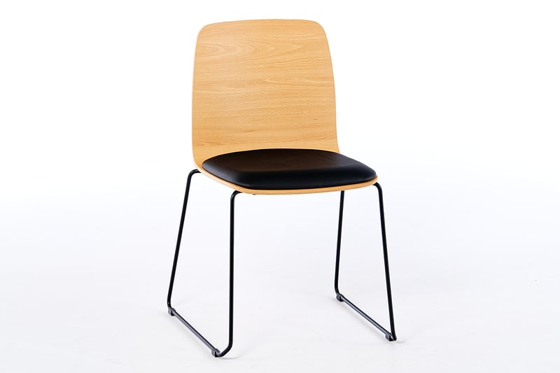 Der Stuhl Manila KU SP mit einer Sitzschale aus Holz